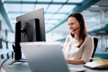 Efficient female customer service agent speaking