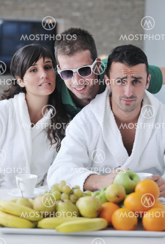 young couple have fun in modern kitchen