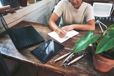 Laptop, writing and woman for creative business for...