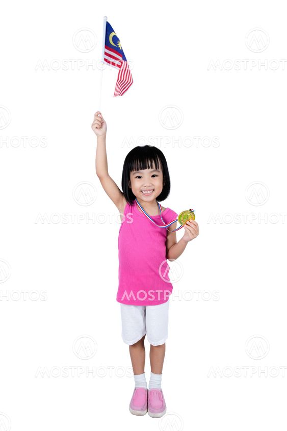 Asian Chinese little girl holding Malaysia Flag with gold...