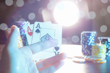 Poker game set of cards and chips close up