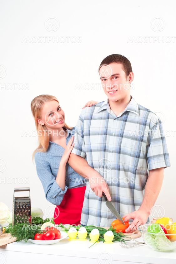 couple of cooking together
