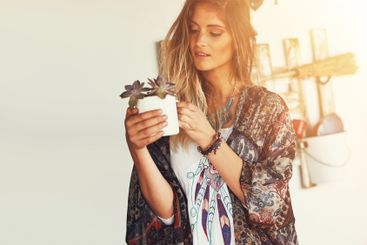 Woman, flower or florist with pot plant for natural...