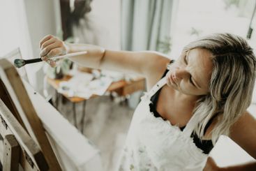 Artist, painting and woman in studio for creative hobby,...