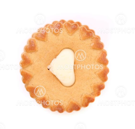 Sweet pastry with white cream heart.