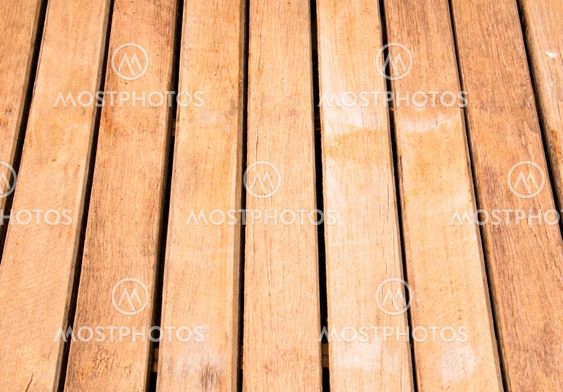 Wood stacked in rows.