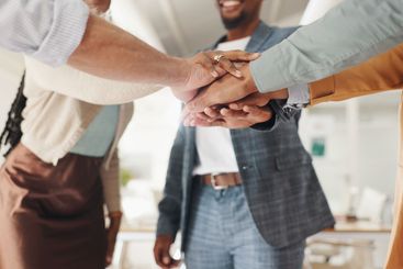 Business people, teamwork and hands together for...
