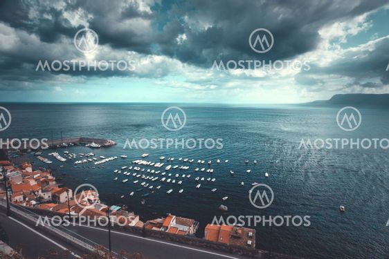 Moody stormy clouds over the mediterranean sea in Scilla...