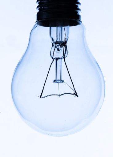 Lightbulb on white background, close up shot