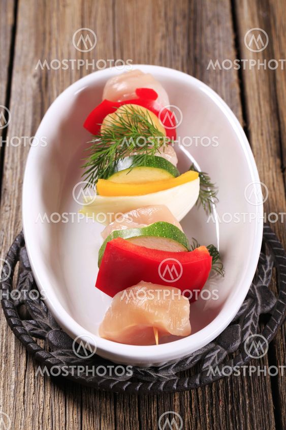 Raw chicken shish kebab