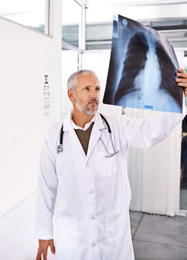 Scan, radiology and thinking with doctor in hospital for...