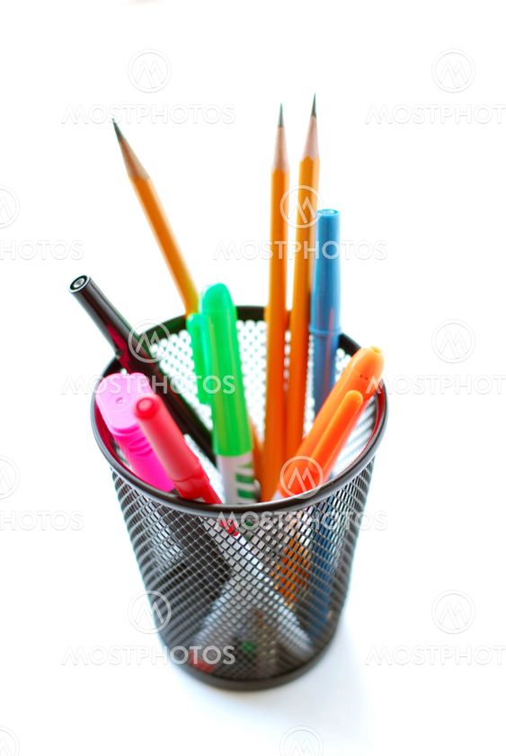 Pens and pencils in pencil holder
