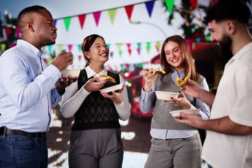 Group Of Friends Having Fun Eating Street Food