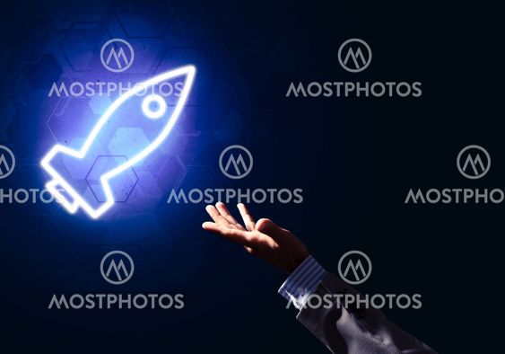 Man palm presenting Rocket web icon as technology concept