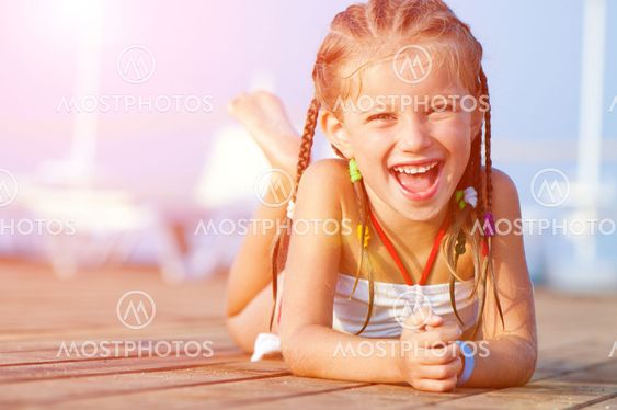 cute girl on a timber floor