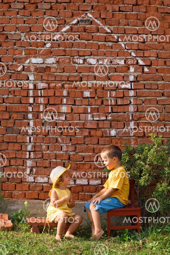 Two happy kids talking