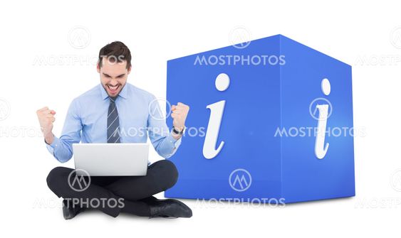 Composite image of businessman sitting with his laptop cheering
