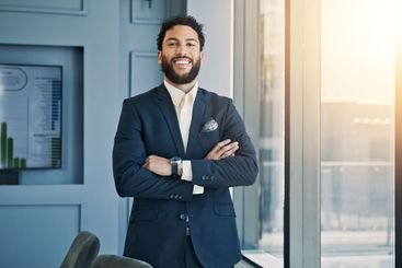Arms crossed, portrait and smile of man in office for...