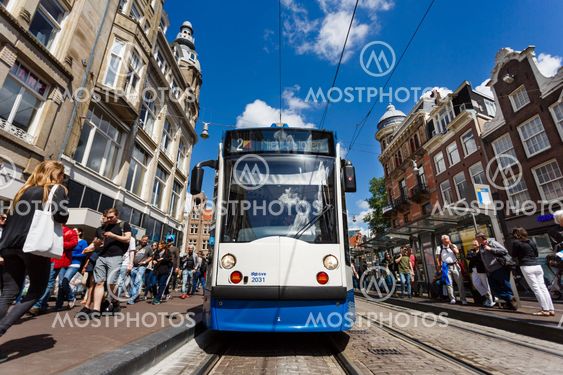 Tram on a busy street of Amsterdam
