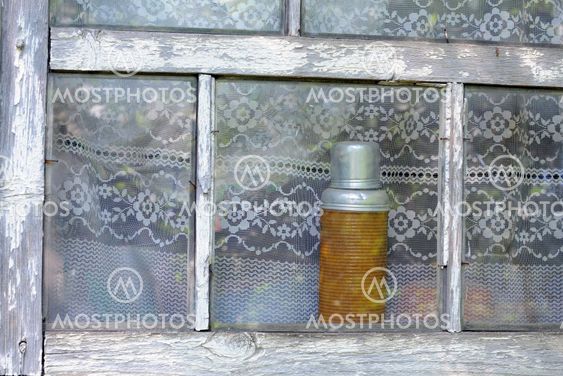 Vintage Vacuum Flask in the Window