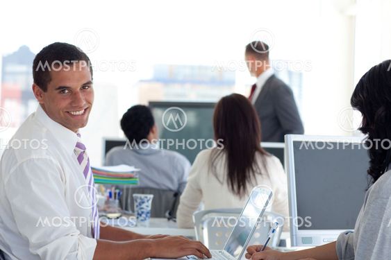 Smiling businessman in a presentation