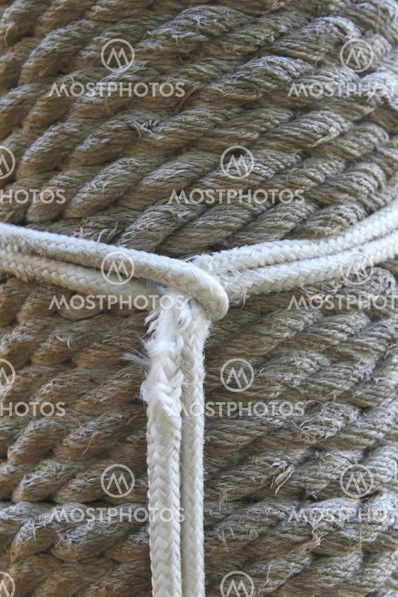 Line as a noose on the background of hemp rope.