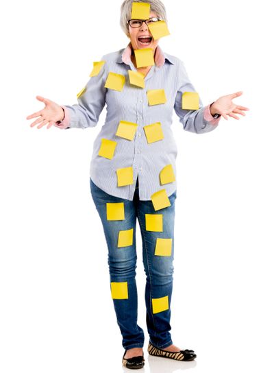Elderly woman with yellow notes