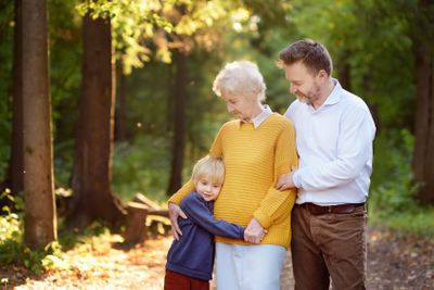 Beautiful eldery woman and her grown ups son, and her...