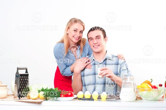 wife gives her husband a meal