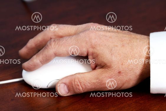 senior's hand on mouse