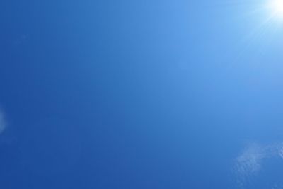 Incoming sunlight on a blue sky