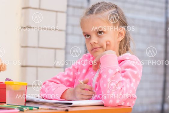 Schoolgirl thought drawing on the album in pencil, in the...