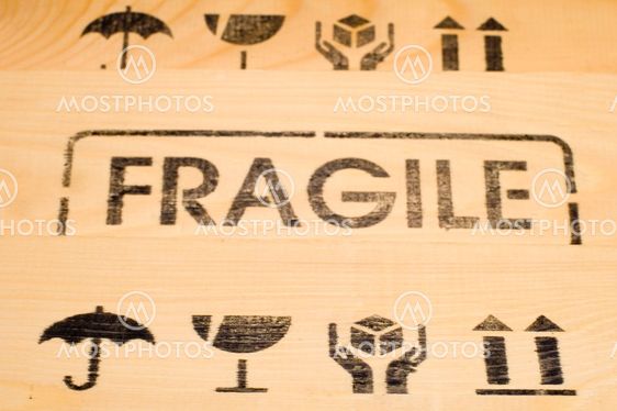 fragile sign on wood