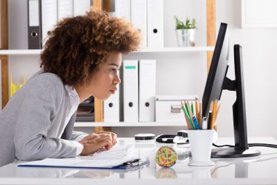 Concentrating Businesswoman Working On Computer