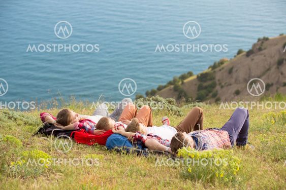 Family resting in mountains