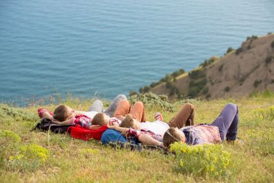 Family resting in mountains