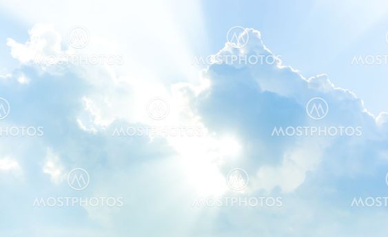 Blue sky with clouds and sunlight