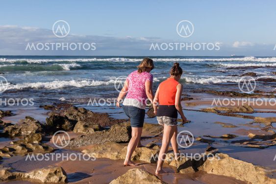 Girls Beach Ocean Exploring