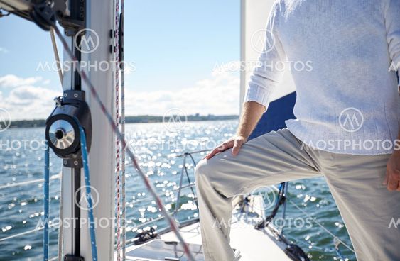 close up of senior man on yacht sailing in sea