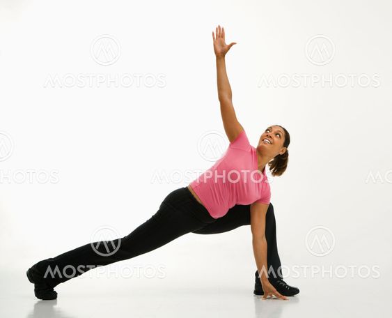 Woman practicing yoga.