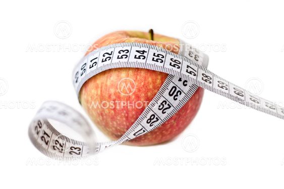 Red apple and measuring tape