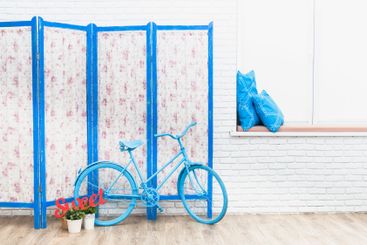 Blue wooden decorating screen with textile panels