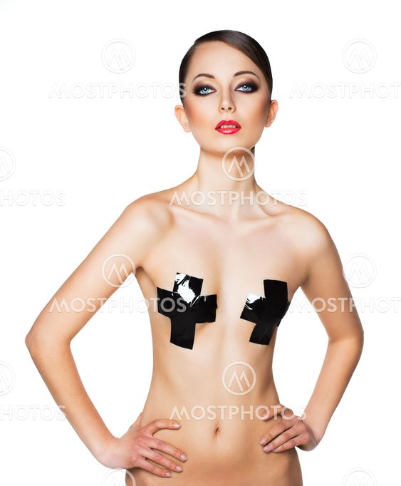Portrait of a beautiful young woman with a glamorous retro makeup