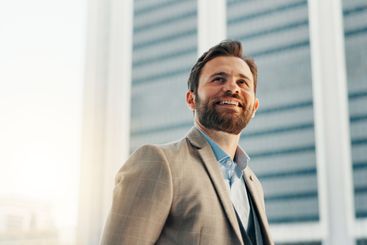 Thinking, smile and business man in city for real estate...