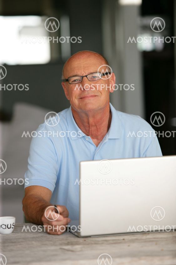 Bald man working from home