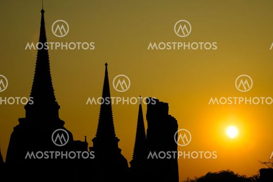 The stupa buddha and sunset