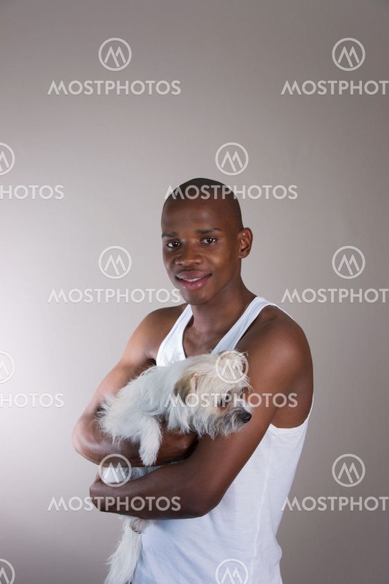 Casual African man with his dog