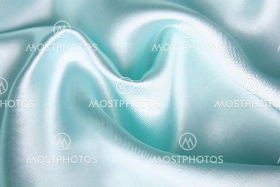 Smooth elegant blue silk as background