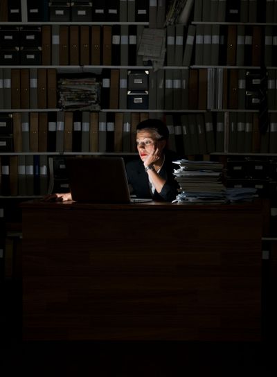 Businesswoman at night