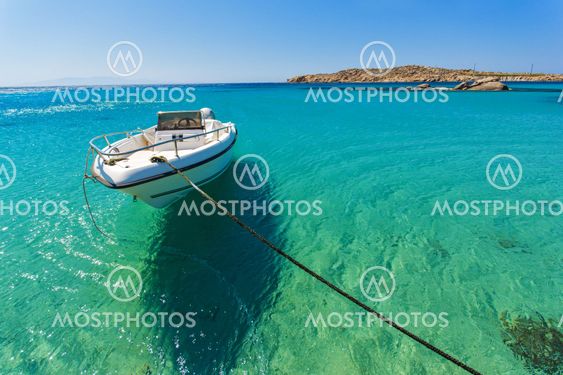 Clear waters of Paranga Beach on the island of Mykonos,...